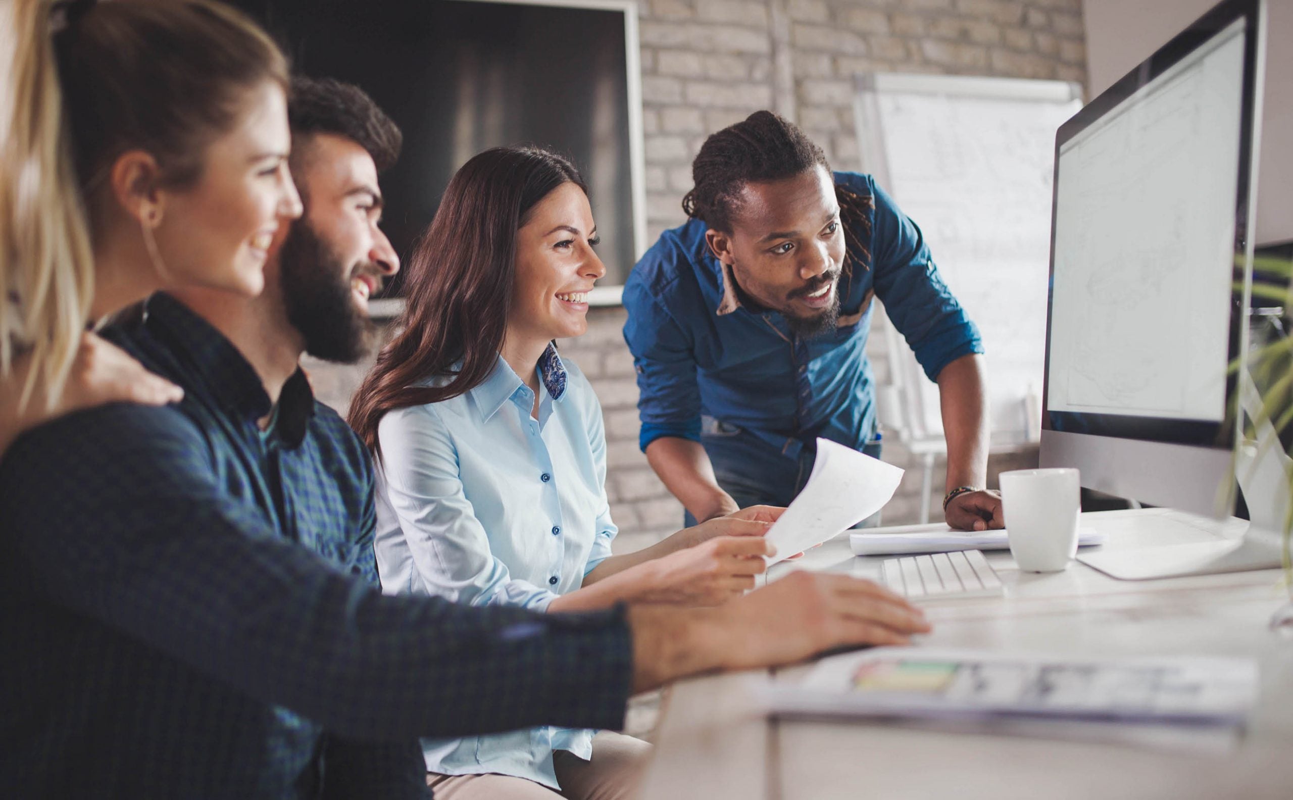 B2B Sales Team Collaborating on AI-Generated Proposals